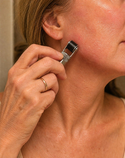 SkinBelow roller on jaw and neck — 60 second evening ritual